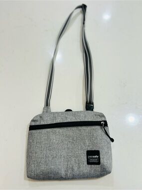 Pacsafe Slingsafe LX50 Anti Theft mini crossbody Travel Bag